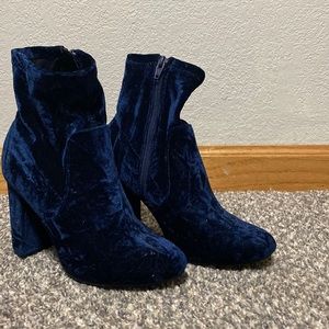 Blue velvet heeled boots